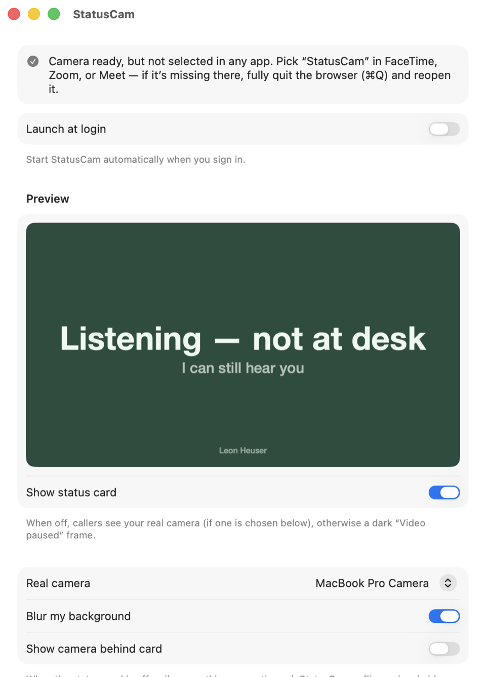 The StatusCam app window: status presets, message fields, theme swatches, camera picker, and a live preview of the status card